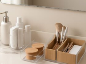 Modern bathroom shelf with acrylic trays, rotating organizer, and minimal decor elements Shower corner organizer filled with shampoo bottles, loofah, and razors—stylish and functional Before-and-after bathroom counter showing clutter transformed using Amazon organizers